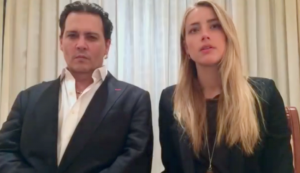 Actor Johnny Depp and his wife Amber Heard, apologizing ineffectively for violating Australia's no-pet law
